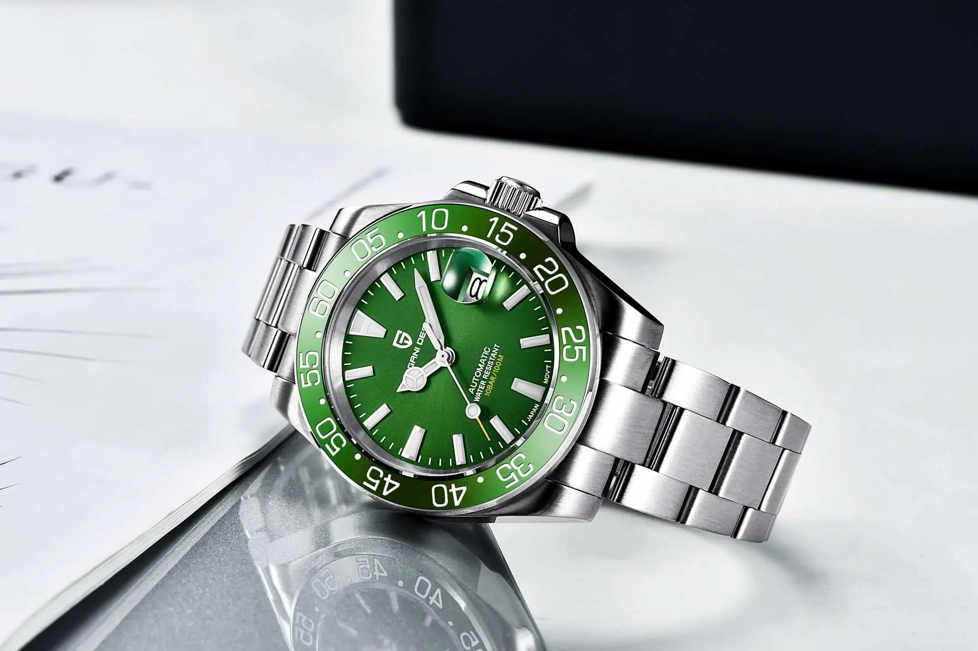Luxury waterproof mechanical watch with green dial and stainless steel strap, sapphire crystal glass, luminous hands, calendar display, and see-through case back.
