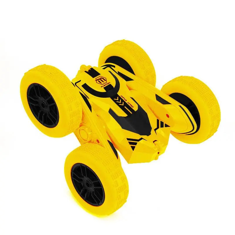 Yellow Storm Stunt RC Car with large off-road tires and 360-degree flip capability