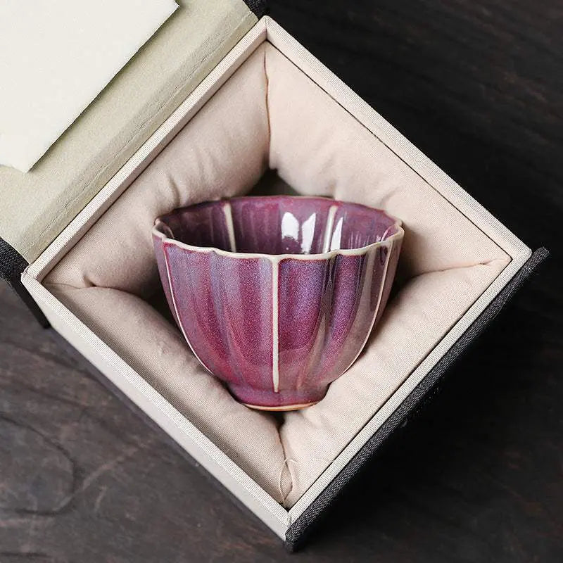 Traditional Chinese ceramic teacup in elegant gift box with purple glaze