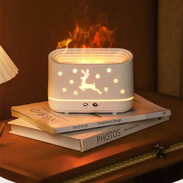 Christmas flame effect essential oil diffuser and humidifier with reindeer and snowflake design emitting cozy flame-like glow and mist