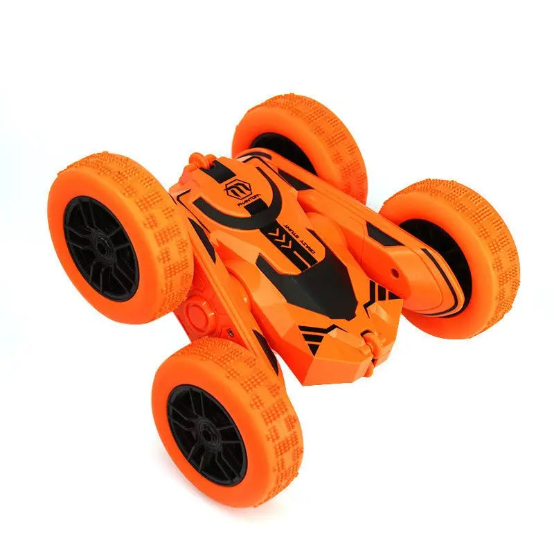 Orange Storm Stunt RC Car with four large off-road tires designed for flips and stunts