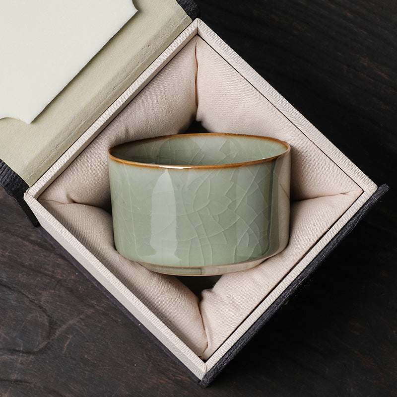 Traditional Chinese ceramic teacup in elegant gift box with soft cushioning