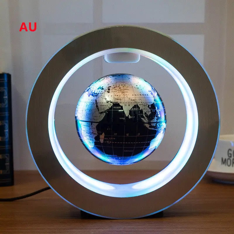 LED Floating Globe with magnetic levitation and soft LED illumination in a modern round frame on wooden surface