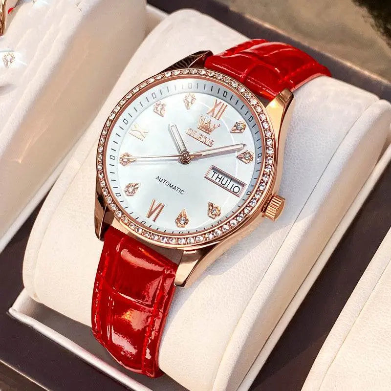OLEVS women's automatic mechanical watch with red leather strap, rose gold case, and calendar display