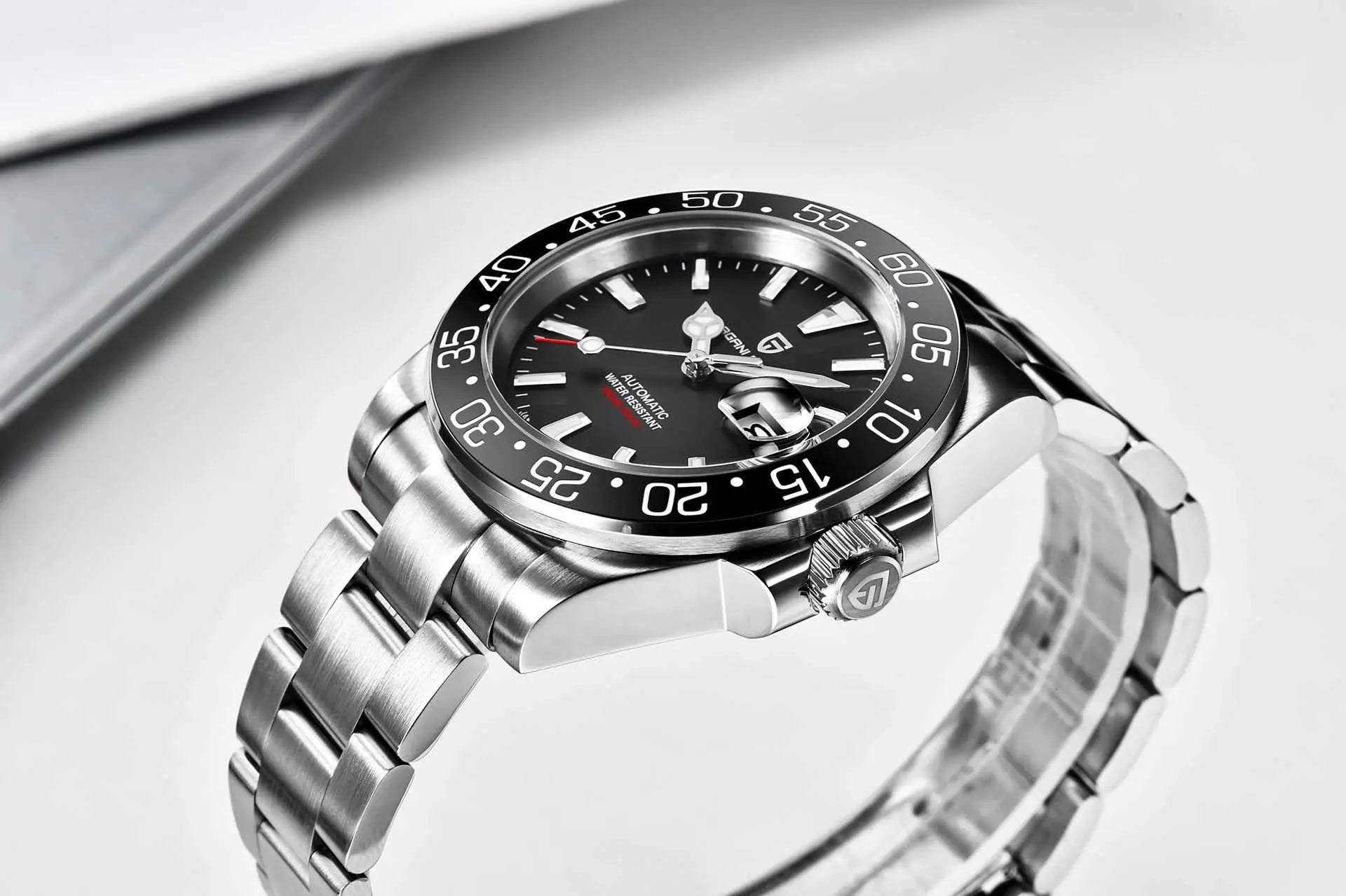 Luxury waterproof mechanical men's watch with black dial, stainless steel case and bracelet, sapphire crystal, luminous hands, and calendar display.
