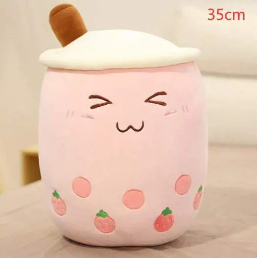 35cm pink plush boba stuffed toy with embroidered squinted eyes and strawberry design
