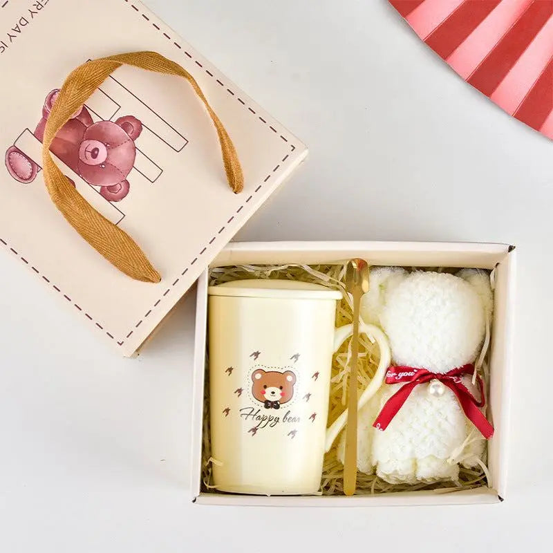 Ceramic cup gift box set with letter print mug, spoon, towel, and gift packaging featuring a bear design.