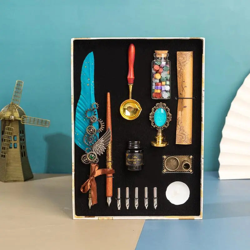 Retro feather pen gift box with wax seal, calligraphy tools, and vintage accessories in luxury packaging