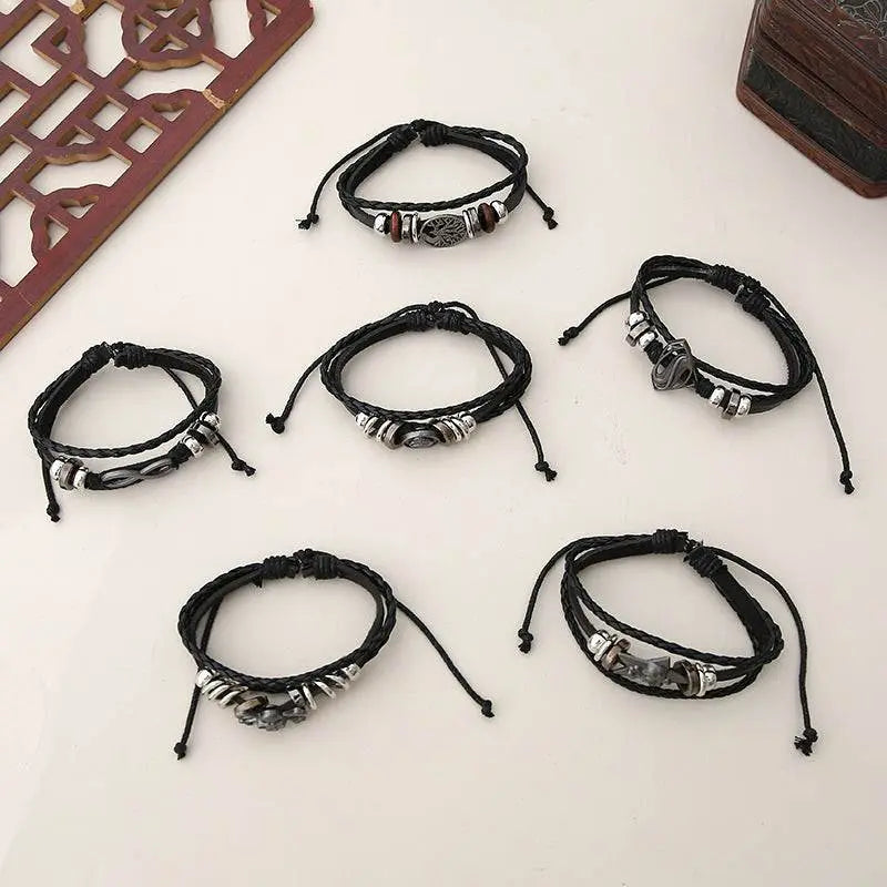 6-piece black leather bracelet set with alloy accents, unisex stackable accessories, hand-woven design, classic style