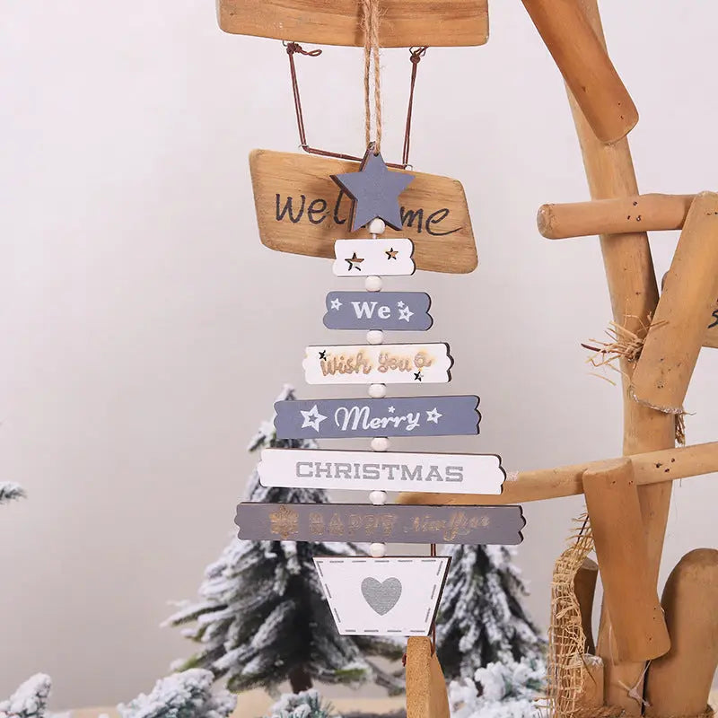 Wooden Christmas Tree Hanging Decoration with festive sayings in rustic design