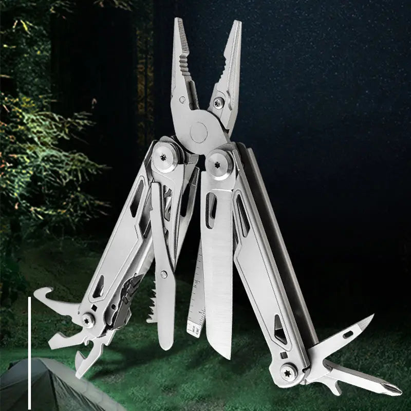 Foldable multitool pliers with scissors, screwdriver, saw, and replaceable wire cutters in stainless steel for outdoor use