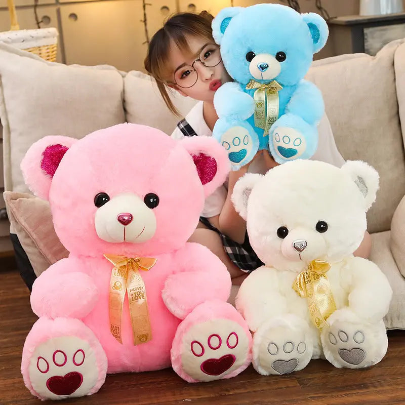 Huggable Heart Teddy Bear Plush in pink, blue, and white with heart accents, soft and cuddly stuffed toys for kids