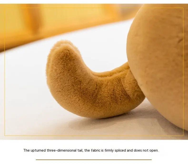 Close-up of upturned three-dimensional tail of soft plush puppy toy showing stitched fabric detail