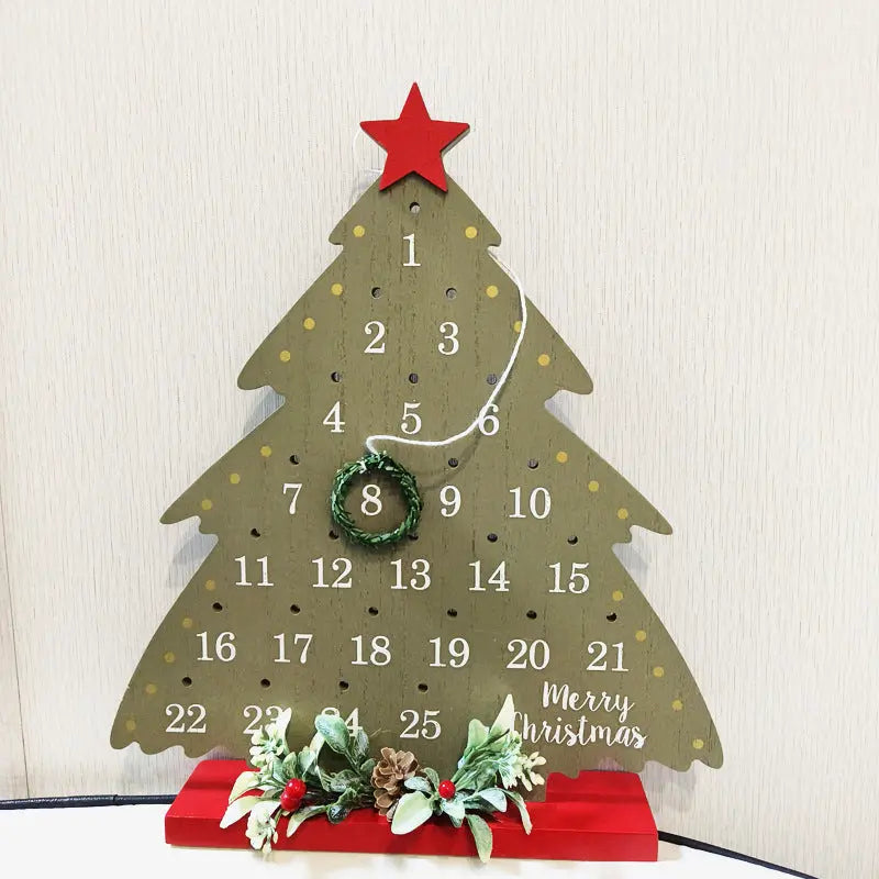 Christmas Wooden Advent Calendar tree-shaped with red star top and festive greenery on red base countdown ornament