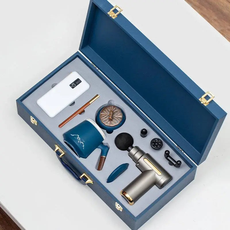 Massage gun gift box with powerbank, mug, and accessories in a blue luxury case
