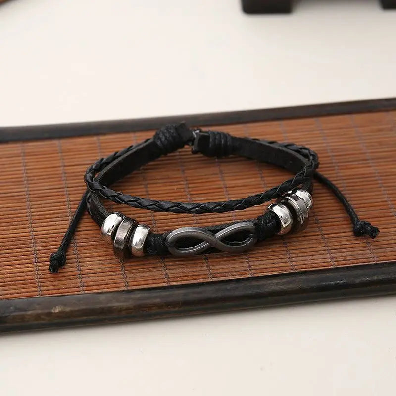 black leather bracelet set with infinity symbol and silver alloy accents unisex style