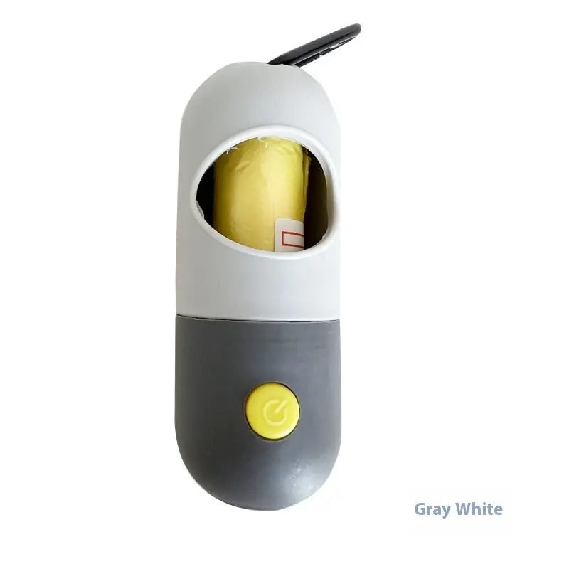 Gray and white device with a yellow button on a white background