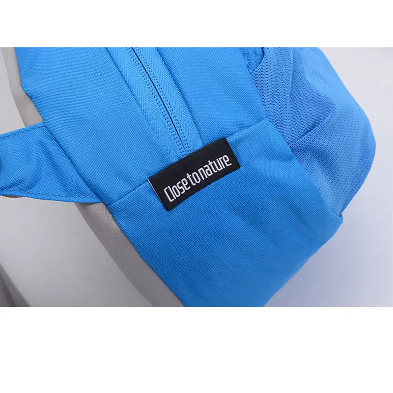 Blue water-resistant nylon outdoor sling crossbody bag for hiking and cycling