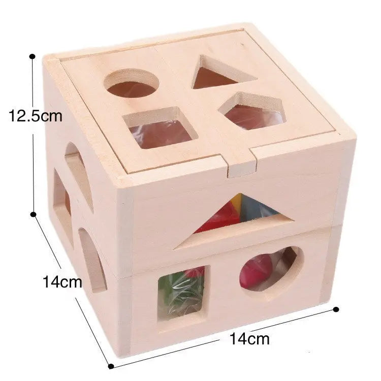 Wooden shape sorting cube with measurements on a white background