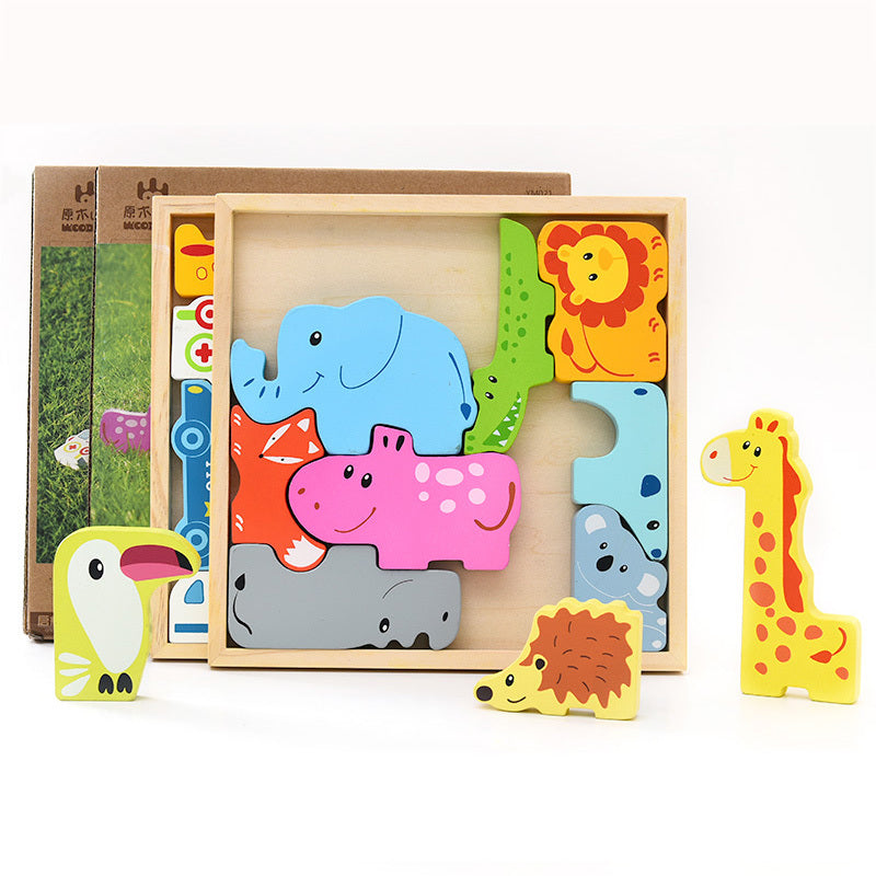 Set of colorful wooden animal puzzles in a box on a white background
