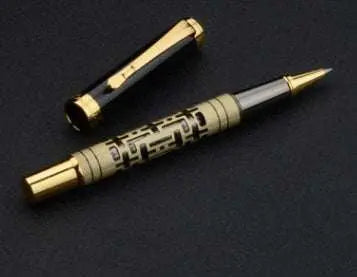Luxury fountain pen with metal shell, iridium nib, and rotating ink supply in yellow bronze finish.