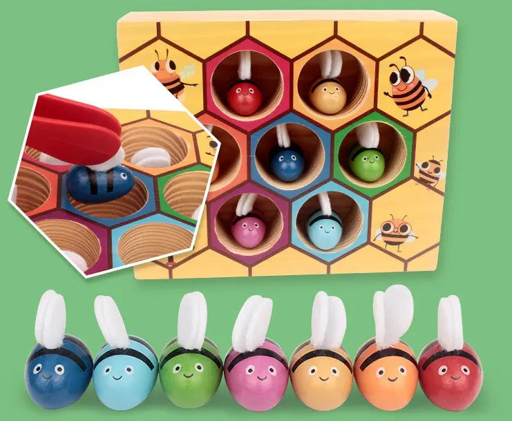 Colorful wooden toy with bee and honeycomb design on a green background