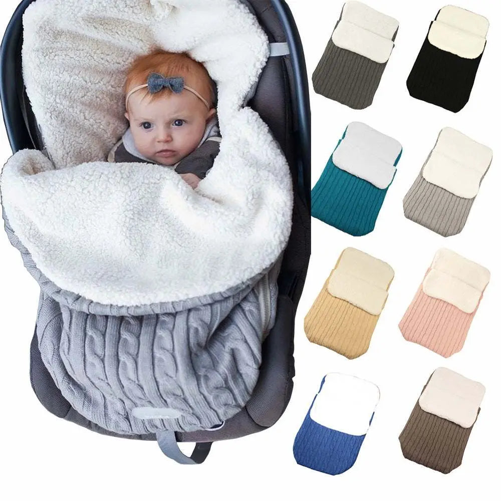 Baby in winter baby buggy sleeping bag with lamb cashmere lining and color options display