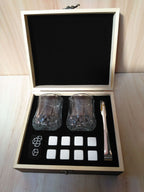 Luxury whisky glasses and stones set in wooden gift box with retro design