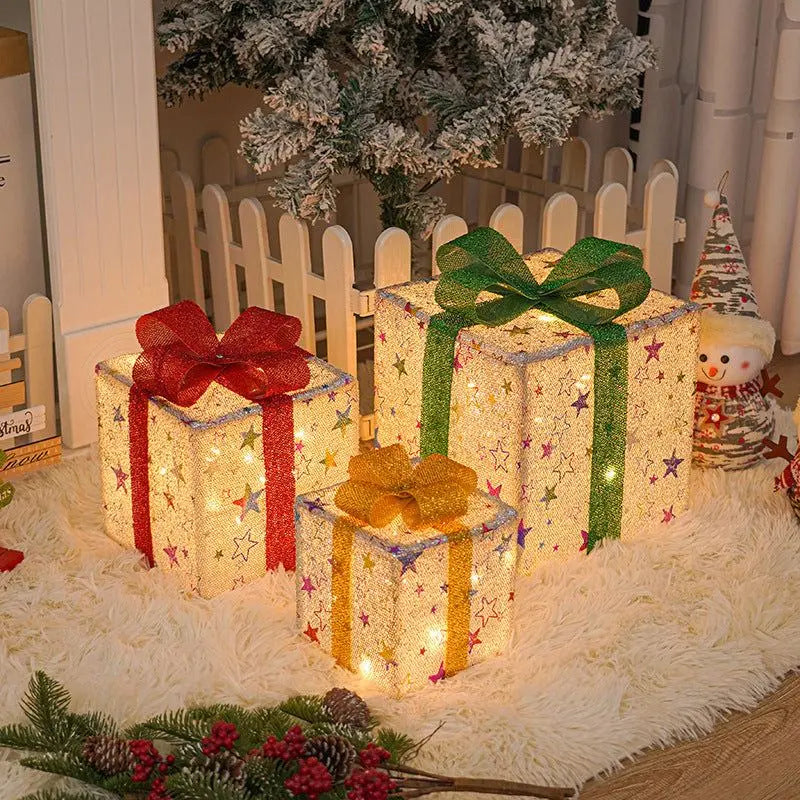 Set of 3 pre-lit Christmas gift boxes with glitter fabric and LED lights under tree decoration