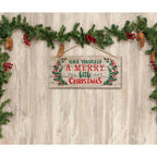 Christmas interior pendant wooden sign with festive greeting and greenery decorations on wooden background