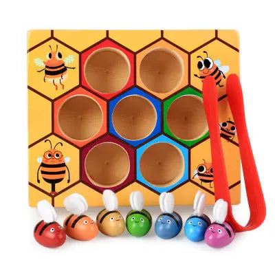 Colorful wooden bee hive game with magnetic bees on a white background