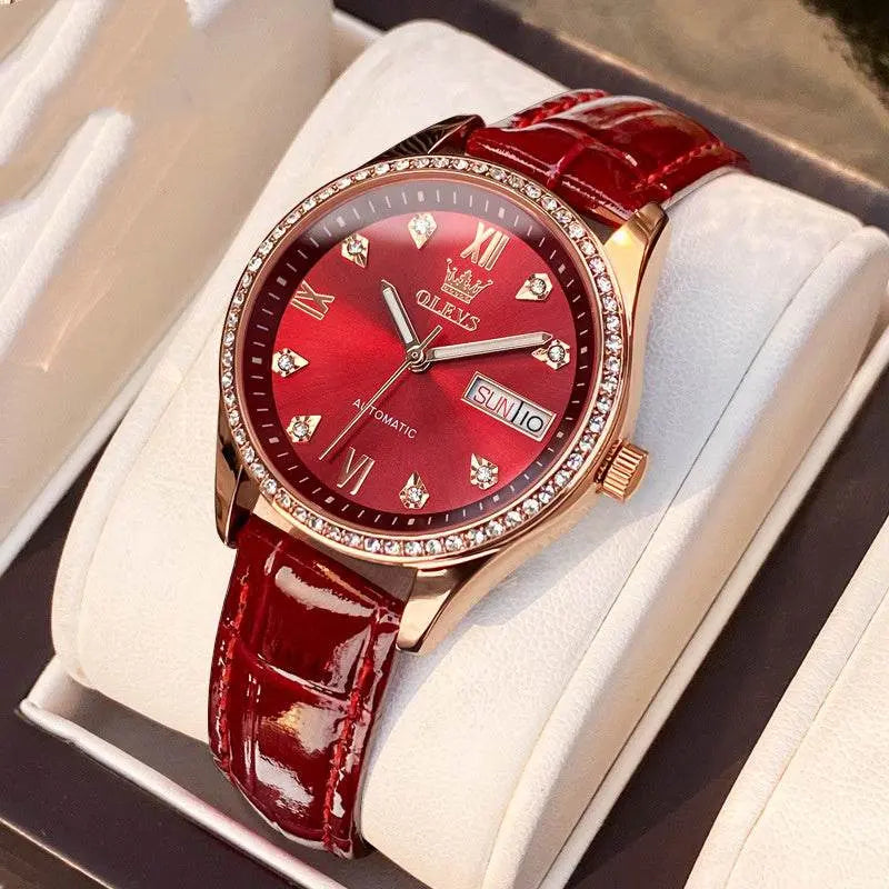 OLEVS Women's Watch with red dial, genuine leather strap, automatic movement, calendar display, and waterproof design