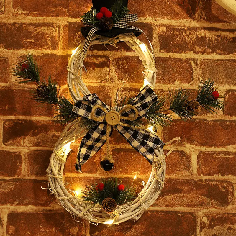 40cm Christmas wreath snowman decoration with LED lights on brick wall