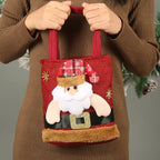Handcrafted red Christmas gift tote bag with Santa Claus design and plush details