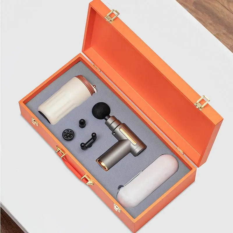 Luxury massage gun gift box set with mug, umbrella, power bank, and accessories in premium orange case