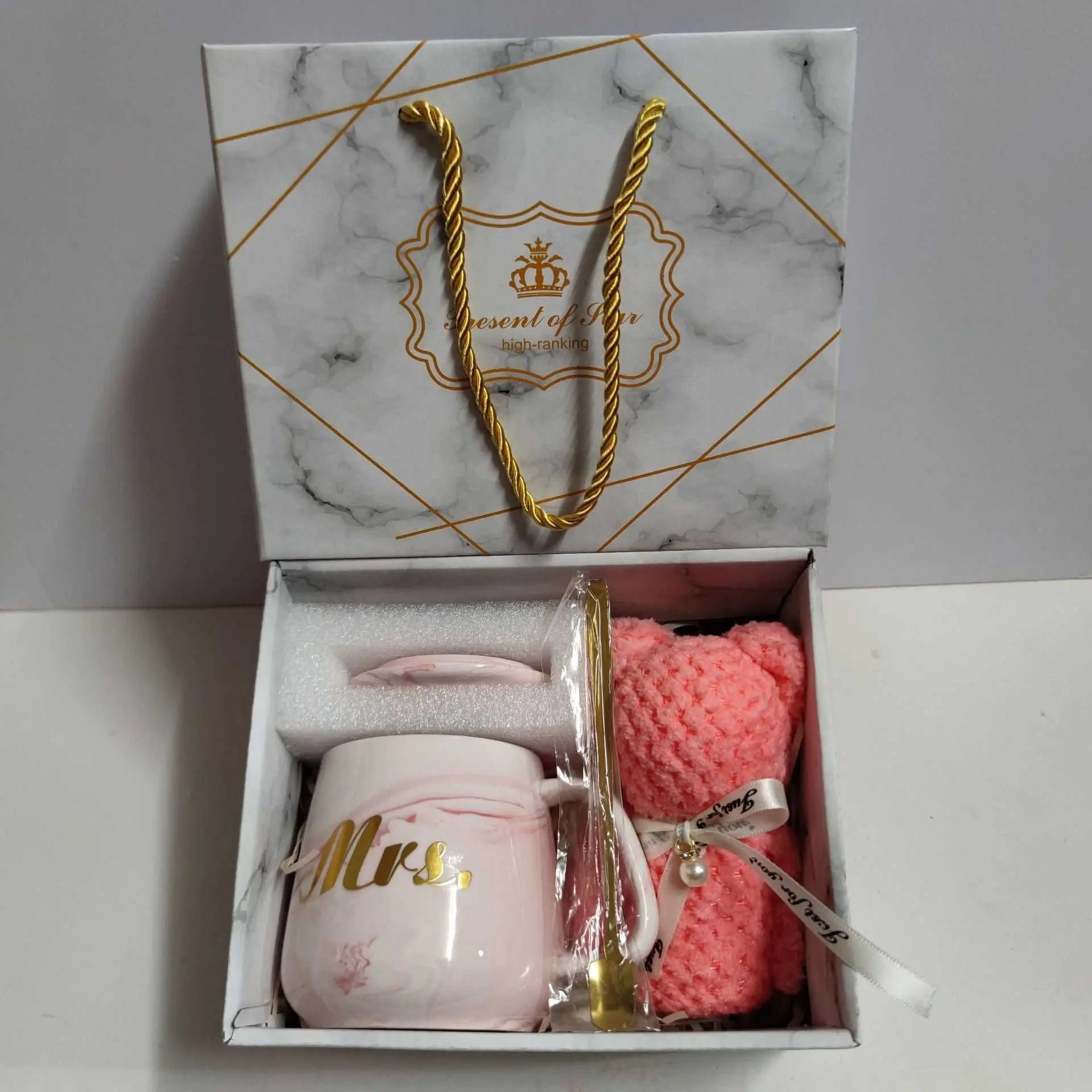 Ceramic Cup Gift Box set with white porcelain letter print mug, gold spoon, pink towel, and marble gift packaging