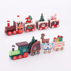 Wooden Christmas train decoration with festive holiday designs including Santa, reindeer, and gifts set on white background