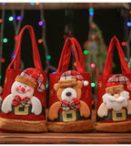 Christmas Gift Tote Bags with snowman, bear, and Santa designs in red fabric for festive holiday use