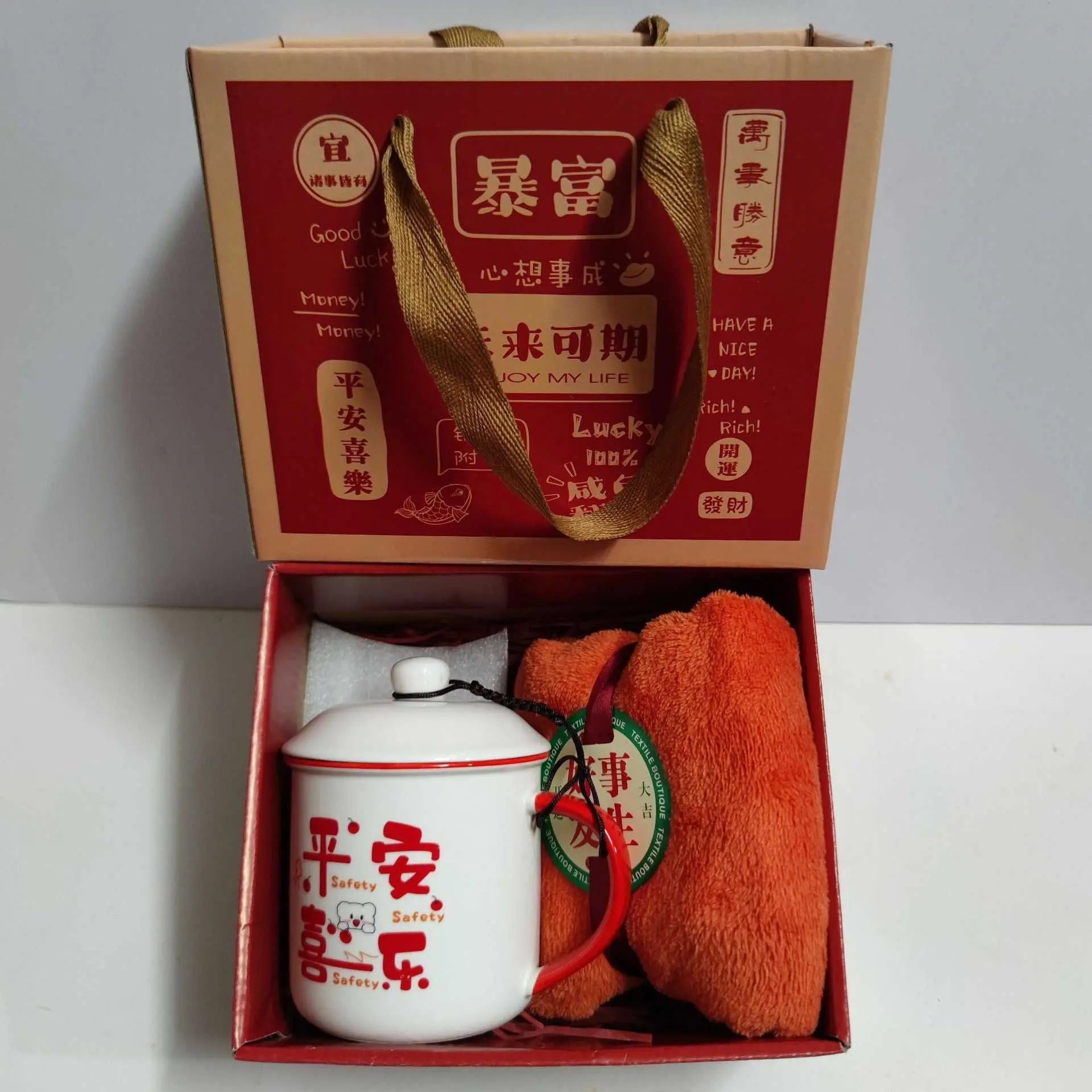 Ceramic cup gift box set with white porcelain mug, red letter print, spoon, towel, and decorative gift packaging