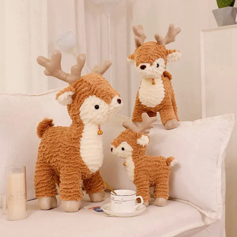 Soft plush reindeer stuffed toys in three sizes with festive design and velvet texture