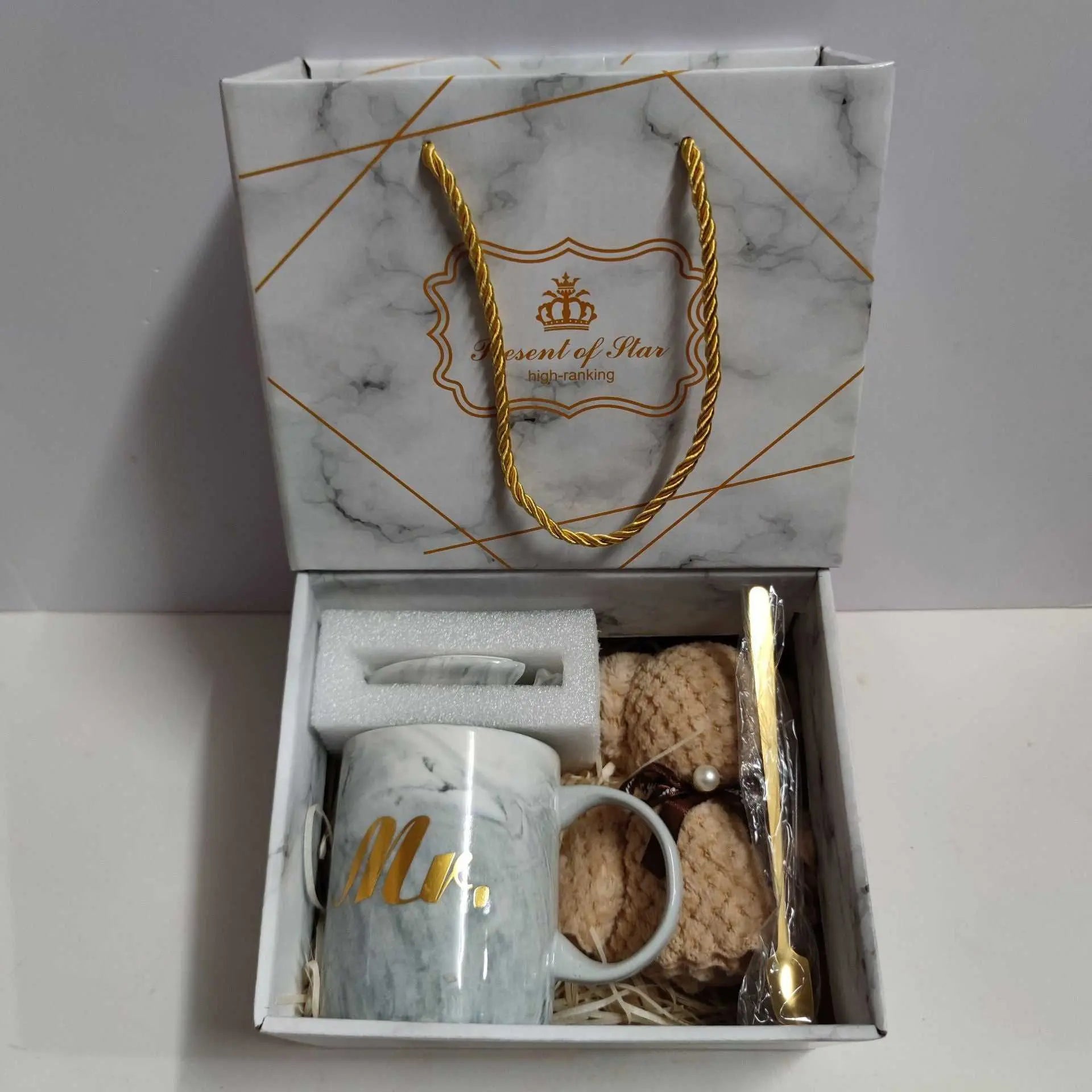 Ceramic cup gift box set with letter print mug, gold spoon, towel, and marble-patterned gift packaging