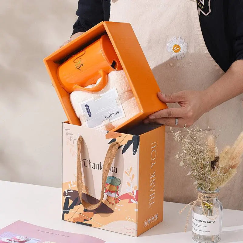 Ceramic cup gift box set with orange letter print mug, spoon, towel, and decorative thank you gift bag