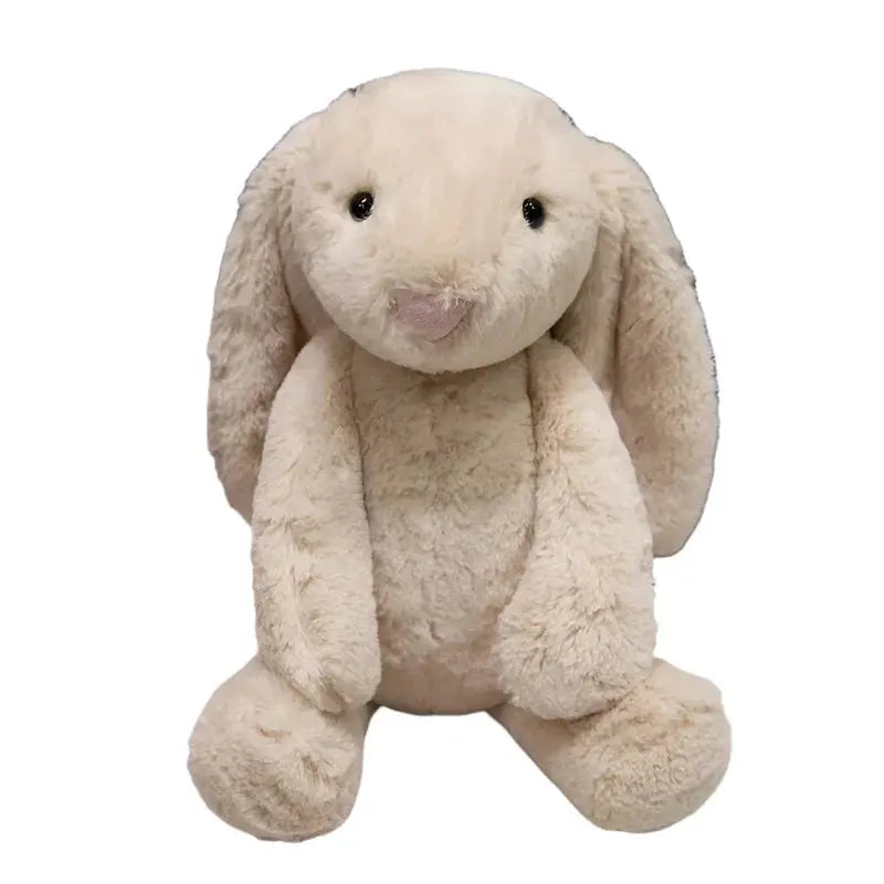 Plush bunny toy on a white background