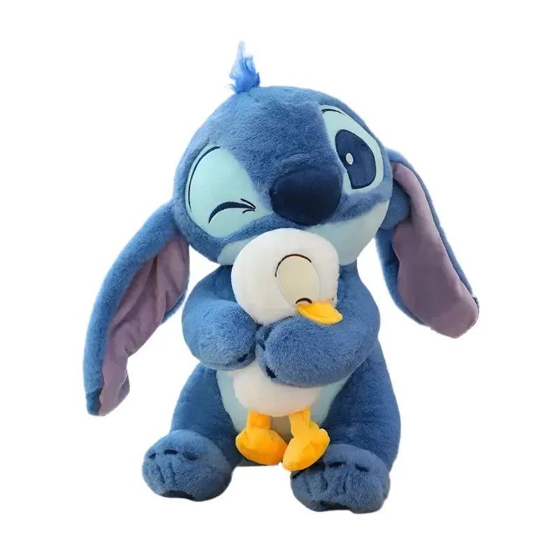 Blue plush toy with a white belly on a white background