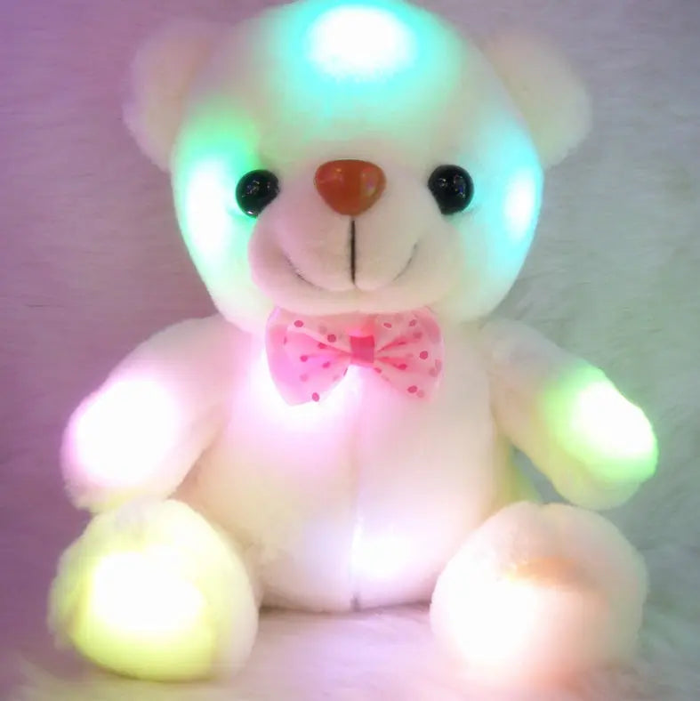 Soft white light up teddy bear plush toy with colorful LED glow and pink bow tie