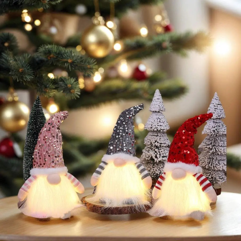 Christmas gnome decoration with light-up sequined hats in red, pink, and grey, festive holiday home decor.