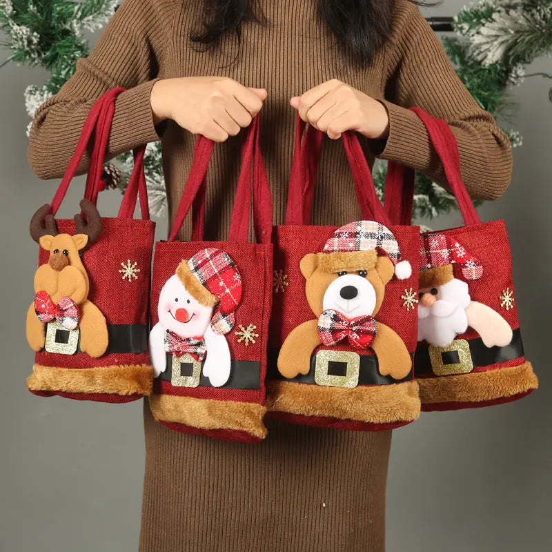Christmas Gift Tote Bags with Santa, Reindeer, Snowman, and Bear festive designs in red cloth with plush and plaid accents.