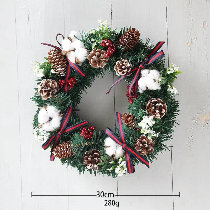 30cm Christmas wreath hanging decoration with pine cones, cotton, red berries, and ribbon accents on PVC garland