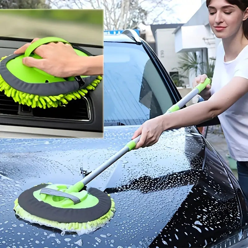 Person cleaning a car window with a green car wash brush, close-up of brush shown.