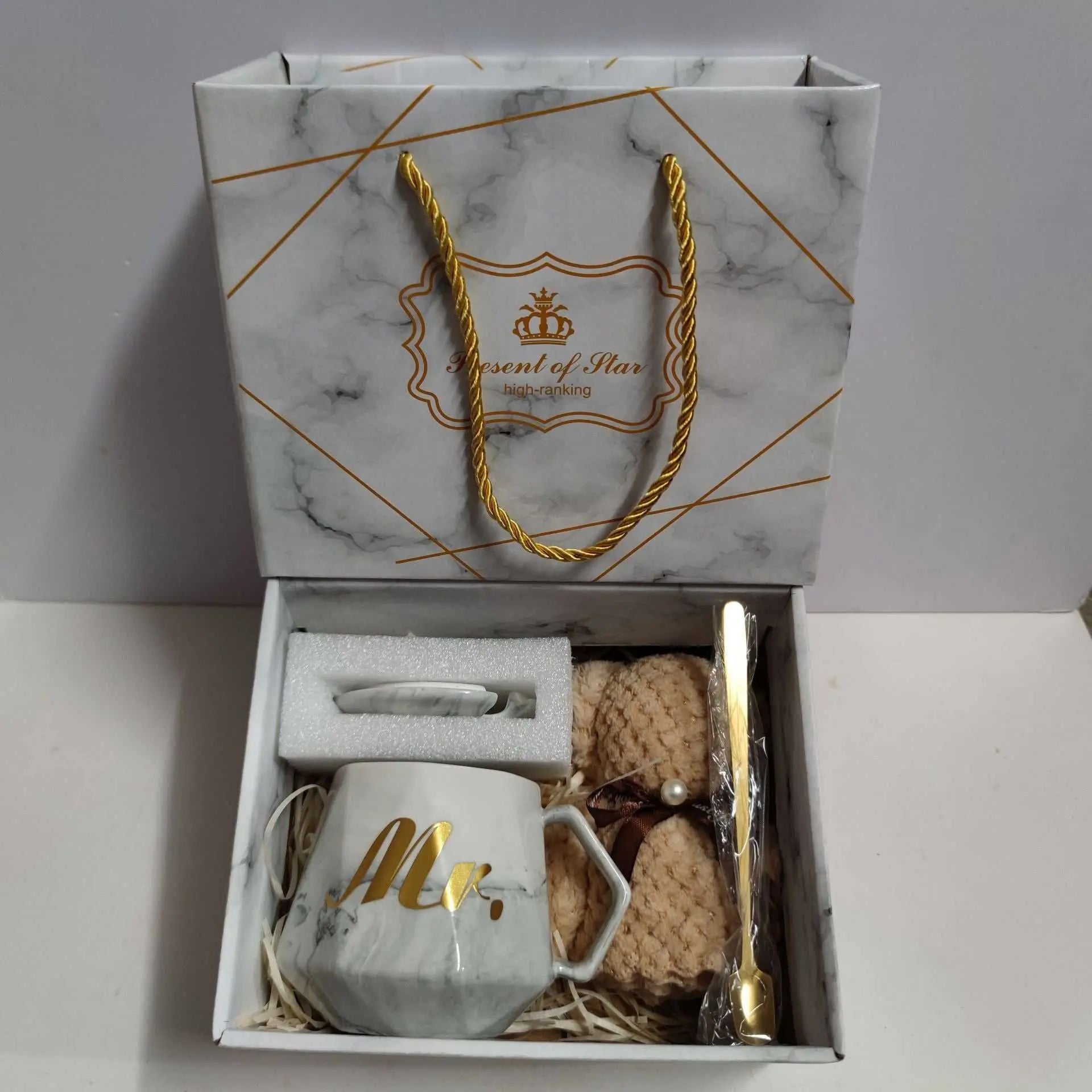 Ceramic cup gift box set with letter print mug, gold spoon, soft towel, and elegant marble-style packaging